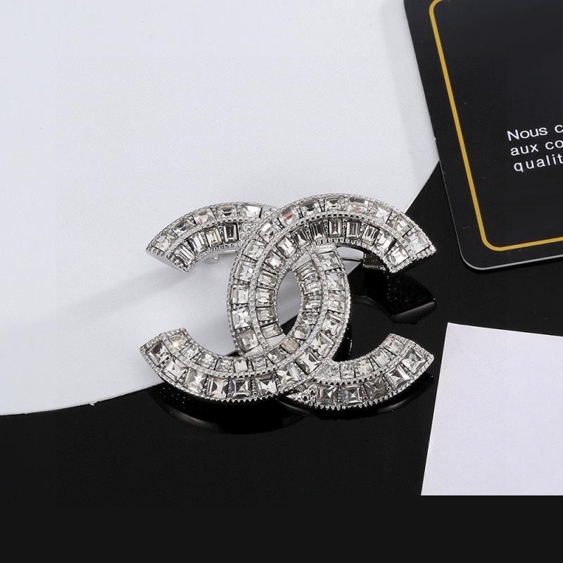 Ch*el brooches